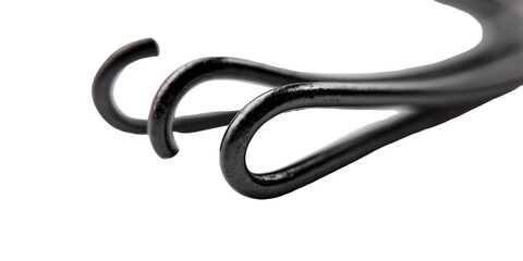 Fototapeta premium Close-up view of intricate, dark-colored metal coils
