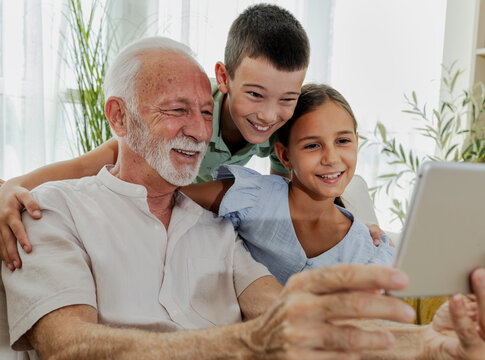 Family bonding moments in cozy living room - Powered by Adobe