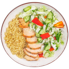 Healthy balanced plate with grilled chicken, bulgur, and fresh vegetable salad.