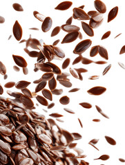Obraz premium Flax seeds scattering and falling from above on transparent background