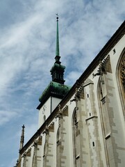 church of st peter and paul in prague Green copper church spire under cloudy sky.