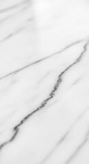 Obraz premium Closeup view of a white marble surface with gray veins, showcasing its natural texture and elegant pattern, perfect for design backgrounds