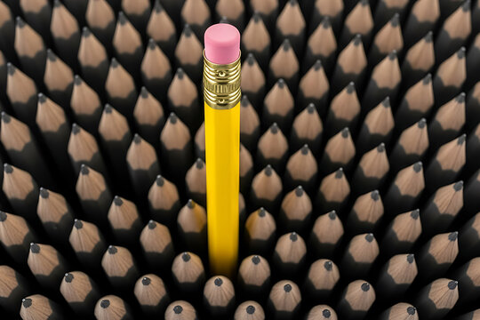 Unique Yellow Pencil Standing Out Among Many Similar Pencils