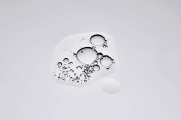 The texture of the serum on a gray background.