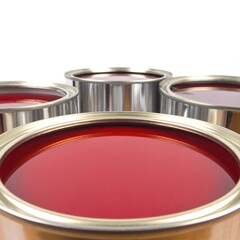 Close-up of several red paint cans