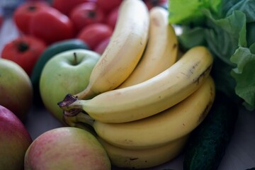 A Vibrant Display of Fresh Fruits and Vegetables Arranged on a Table apple banana tomato groceries...
