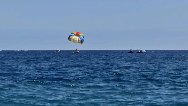 Come and experience the exhilarating excitement of parasailing high above the stunning ocean waters below you