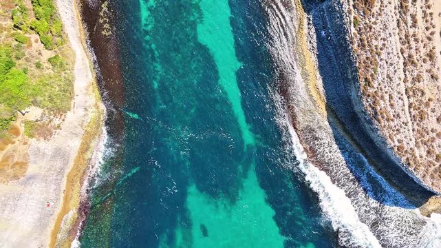 4K drone video of Kadırga Bay with its turquoise sea and magnificent rocks in Agva-Sile in Istanbul, Turkiye.