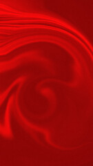 Abstract flowing red fabric with soft light and shadow creating a dynamic swirl pattern