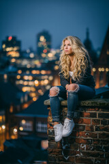 Portrait of a beautiful girl in denim clothes, studio lighting