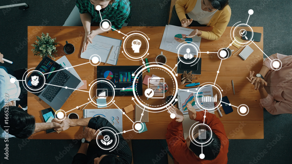 Poster a diverse team engages in a business meeting, utilizing digital tools and analytics, illustrating co