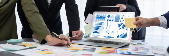 Analyst team use sticky note for creative and analytic brainstorm for business idea with BI data...