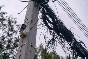 Tangle of Wires on Utility Pole