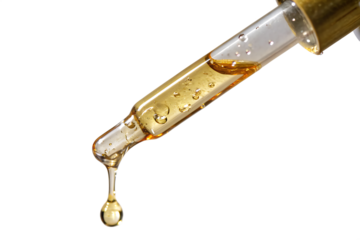 Cosmetic pipette with drops of cosmetic oil close-up isolated on AI generated by PNG