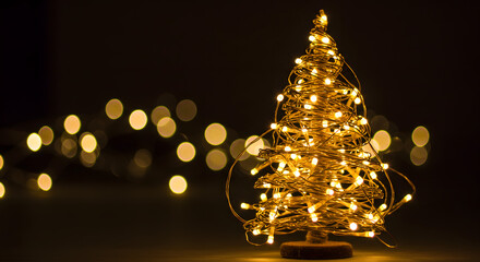 Warm glowing Christmas tree lights create festive atmosphere for holiday celebrations