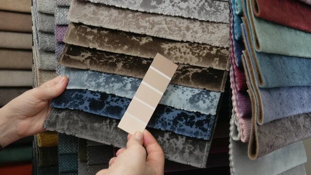 Materials for the interior of the house are selected by the designer's hands. The designer chooses textiles for furniture making using a color palette