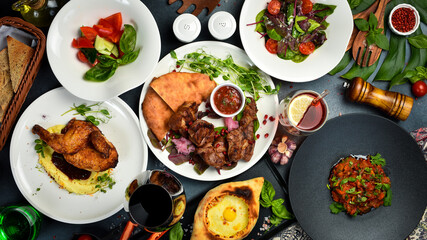 view from above of food and dishes of Georgian cuisine. Healthy meal. Top view.
