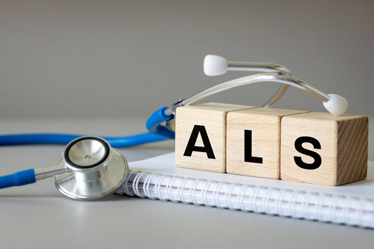 The term ALS, which stands for Advanced Life Support or amyotrophic lateral sclerosis. The sign on the wooden blocks in the doctor's office