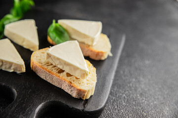 Processed cheese spread portion size cheese for sandwich tasty snack fresh delicious gourmet food background on the table rustic food top view copy space