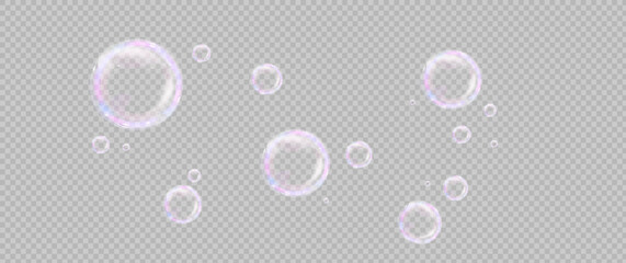 Colorful soap bubbles on a transparent background. Bright, dreamy bubbles with a rainbow gradient effect. Realistic soap bubble element vector set. Vector