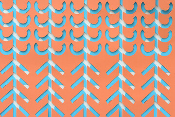 orange on blue background with machine-cut decorative paper shapes featuring linear and curve...