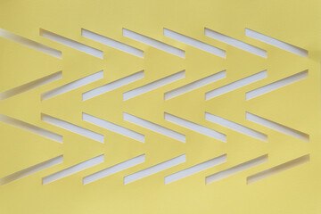 yellow paper with chevron cutouts