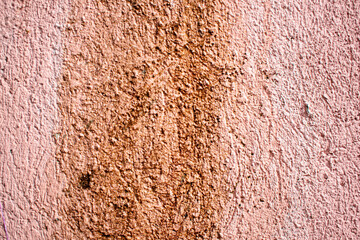Imagen horizontal de una pared sucia marron
