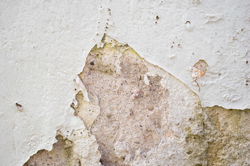 Imagen horizontal de una pared viej ay despintada por el tiempo para una textura