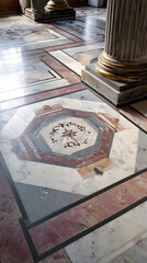 Elegant marble floor design showcasing intricate patterns and classical architecture in historical setting
