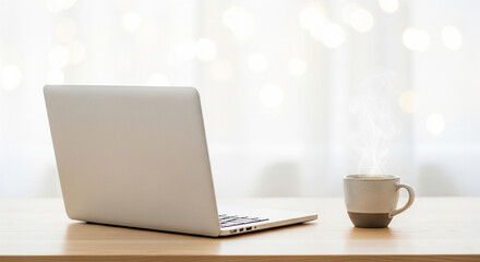 laptop and coffee cup on the desk