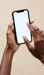 African American hand is holding a modern mobile phone with white screen