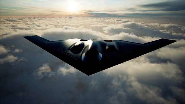 B-2 Spirit Stealth Bomber Majestic Flight Above Clouds at Sunset - 4K Aerial Stock Footage
