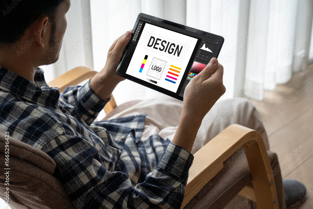 Aufkleber graphic designer software for modern design of web page and commercial ads showing on the computer s