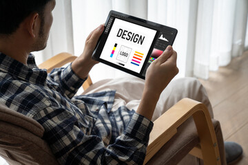 Graphic designer software for modern design of web page and commercial ads showing on the computer...