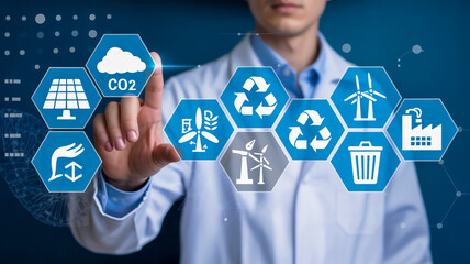 Scientist interacts with digital display of sustainable energy icons, symbolizing green technology and environmental progress.