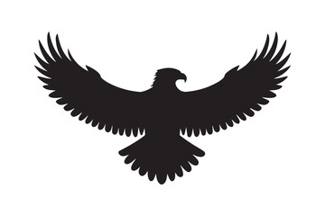Obraz premium Silhouette of an eagle with outstretched wings in flight