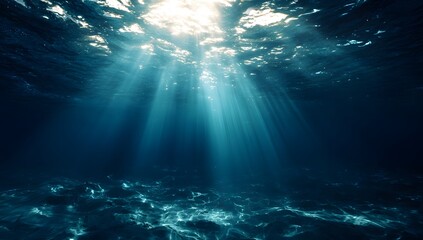 Fototapeta premium Sunlight piercing through deep blue ocean waters illuminating the underwater world