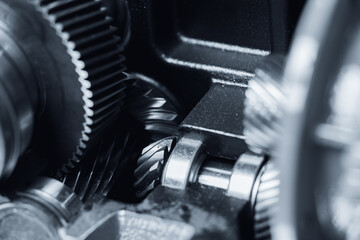 Close-up of cnc milling machine with geared mechanical components. Concept machinery precision