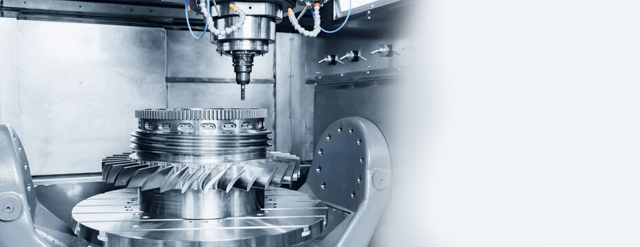 Cnc milling machine with precision cutting turbine wheel, banner industrial workshop