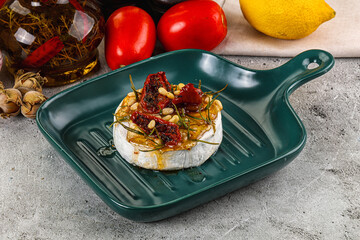 Baked camembert cheese with honey