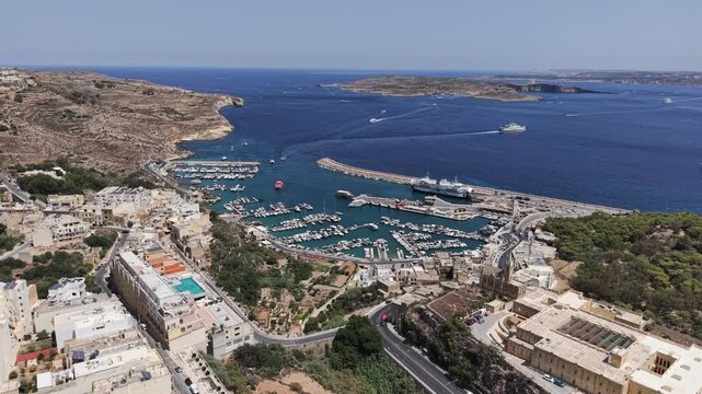 Mgarr Harbor in Gozo, Malta aerial drone video day
