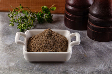Ground dry black pepper powder