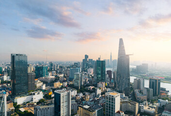Aerial view of Ho Chi Minh City skyline and skyscrapers on Saigon river. Financial business center...