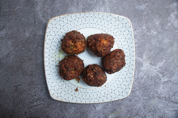 Deep Fried Chicken Cutlets ball kabab a Plate top view of Indian food