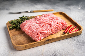 Uncooked mince veal and pork meat, raw forcemeat. white background. top view