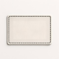 Blank rectangular fabric patch mockup with stitched border on white background, perfect for branding design.