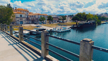 Port of l'Houmeau in Angoulême with a beautiful view of the Charente River from a bridge