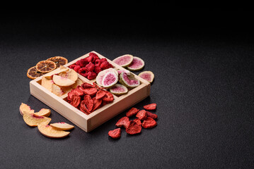 Box of dried fruits strawberries, raspberries, figs and peaches. Dried fruits