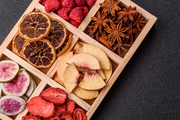 Box of dried fruits strawberries, raspberries, figs and peaches. Dried fruits
