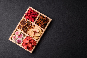 Box of dried fruits strawberries, raspberries, figs and peaches. Dried fruits